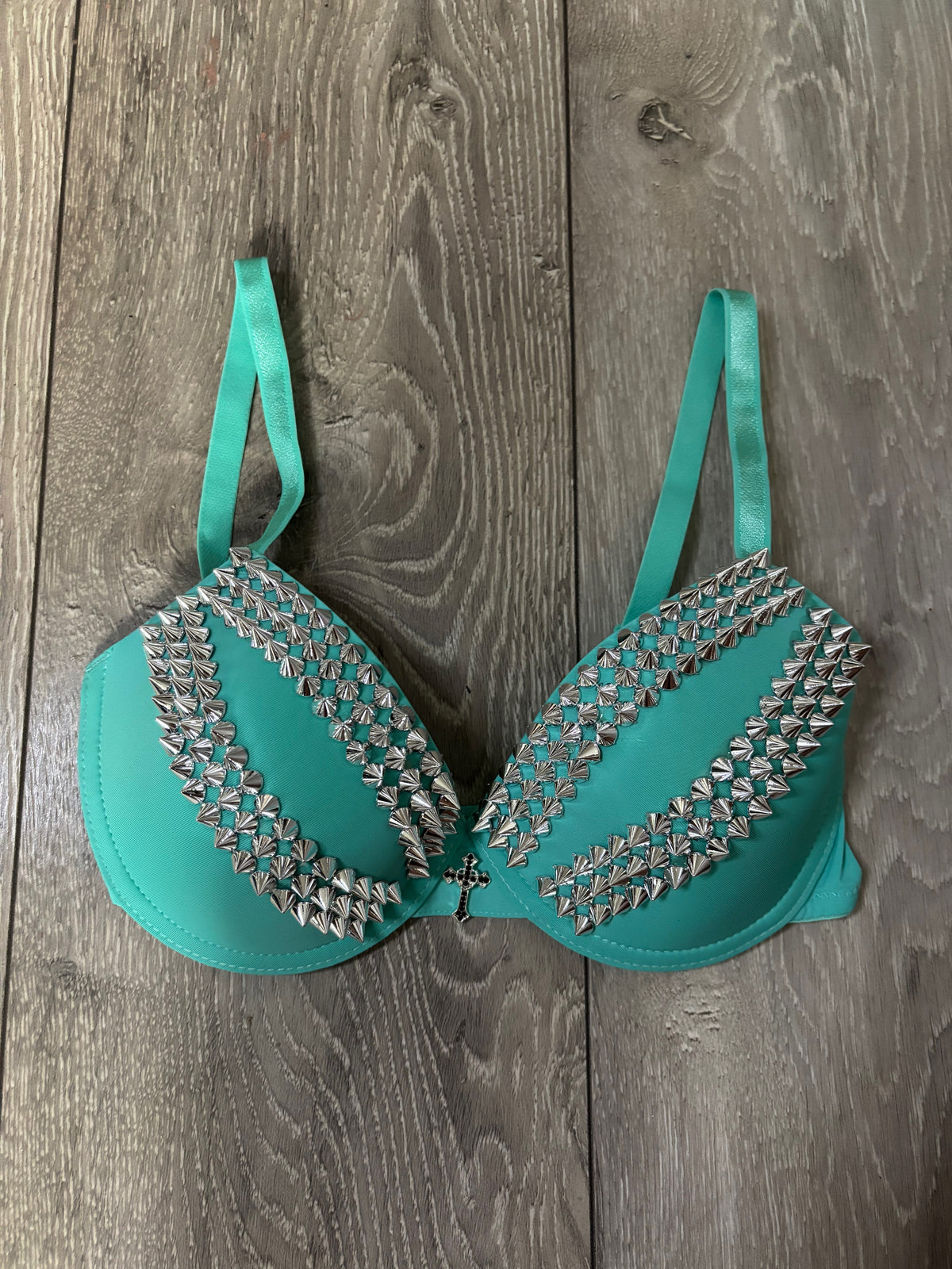 Turquoise spiked (with cross) push up bra