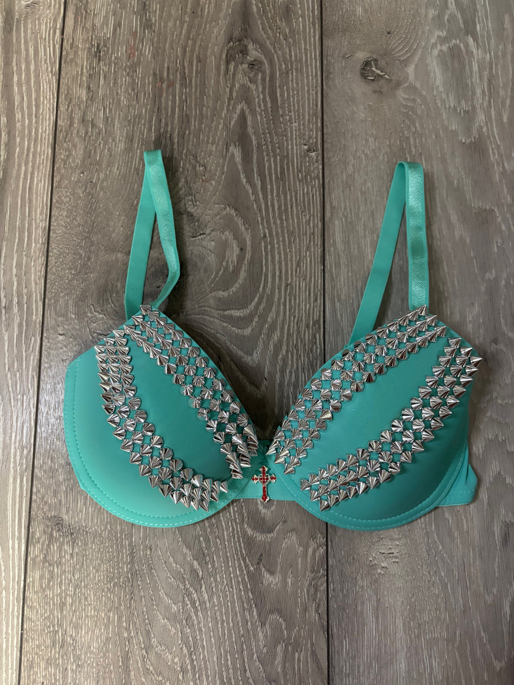 Turquoise spiked (with cross) push up bra