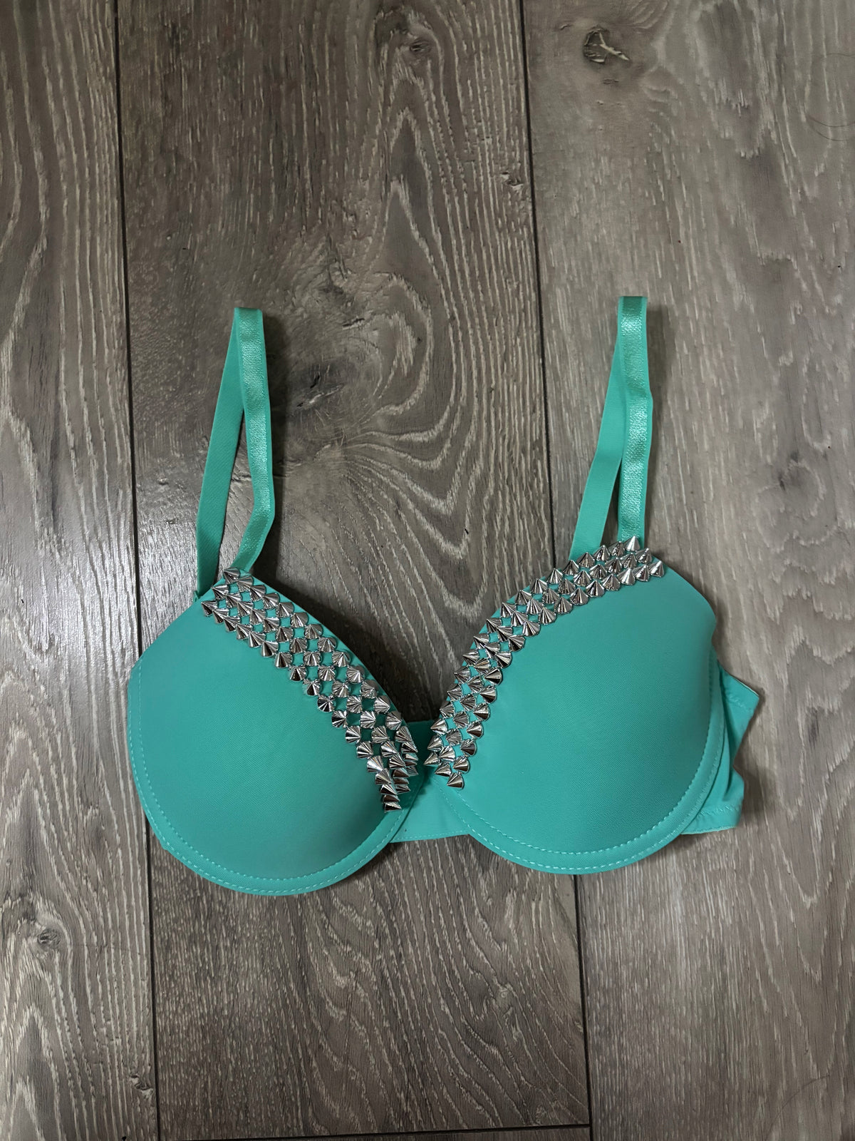 Turquoise single strip spiked (no cross) push up bra