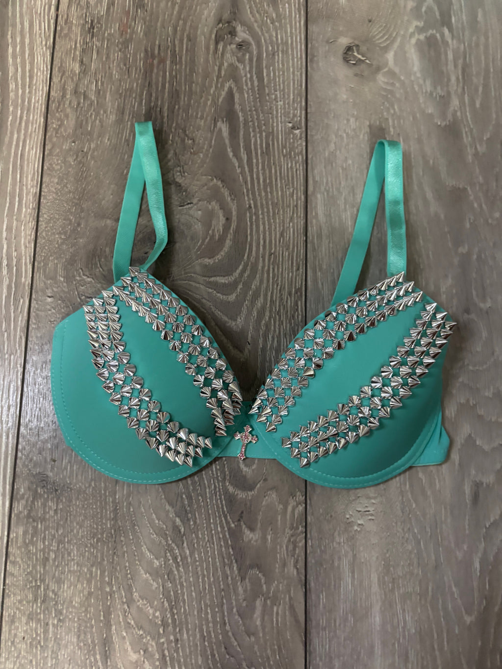 Turquoise spiked (with cross) push up bra