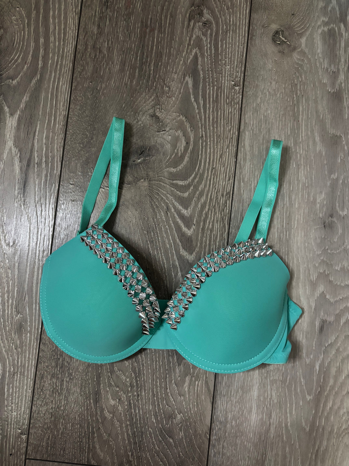 Turquoise single strip spiked (no cross) push up bra