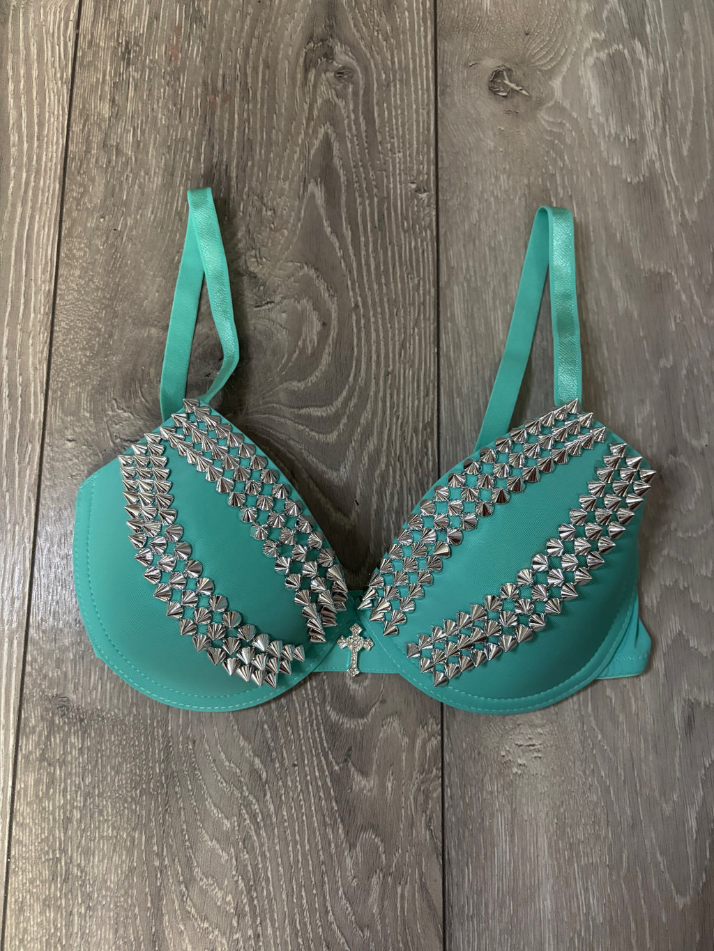 Turquoise spiked (with cross) push up bra