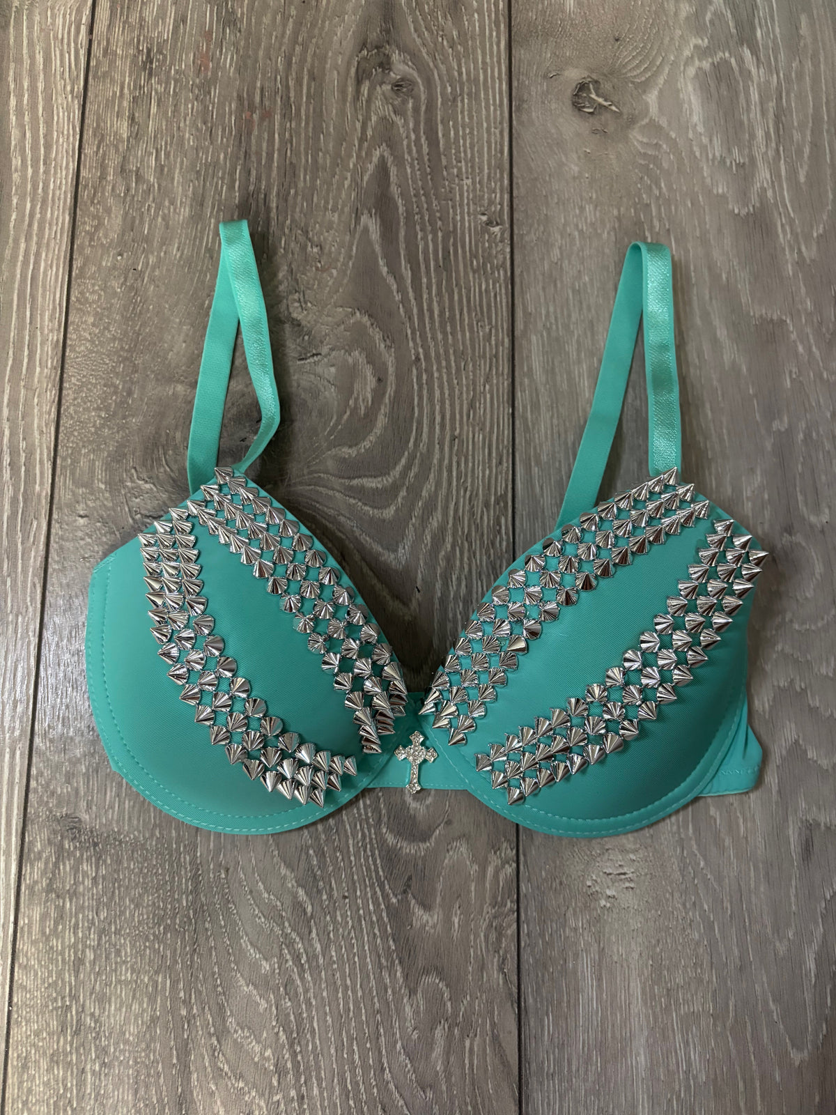 Turquoise spiked (with cross) push up bra