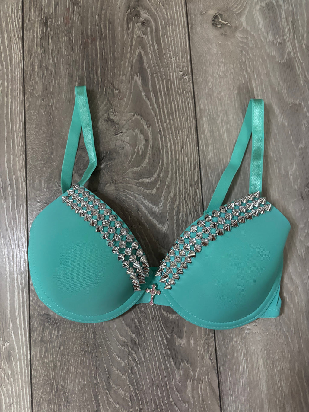 Turquoise single strip spiked (with cross) push up bra